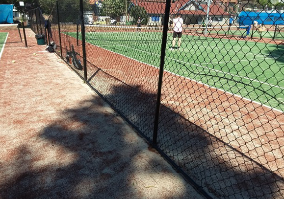 Fixing tennis court fencing issues, tennis court fencing wire curling up at bottom